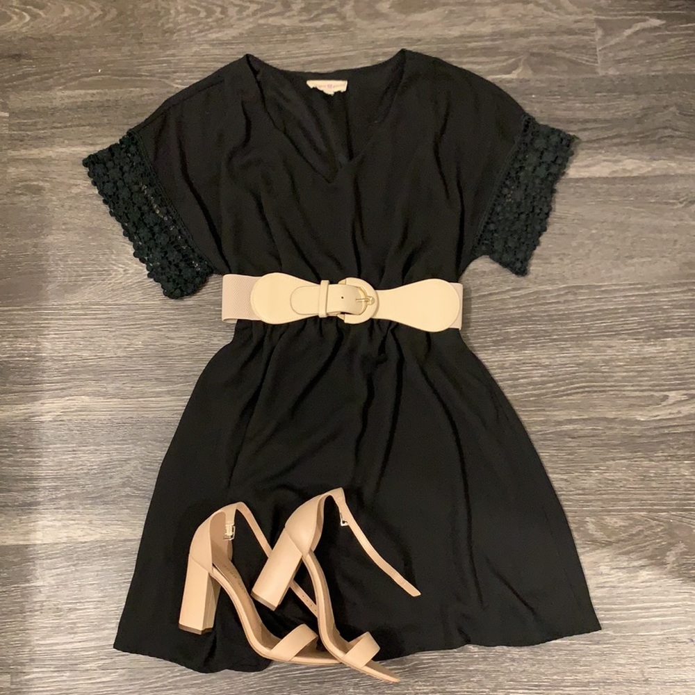 Black dress with embroidered sleeve accent